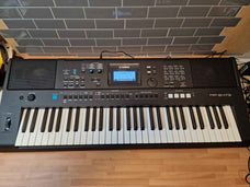 Teclado Yamaha  Principiante con 61 Teclas Sensibles al Táctil,